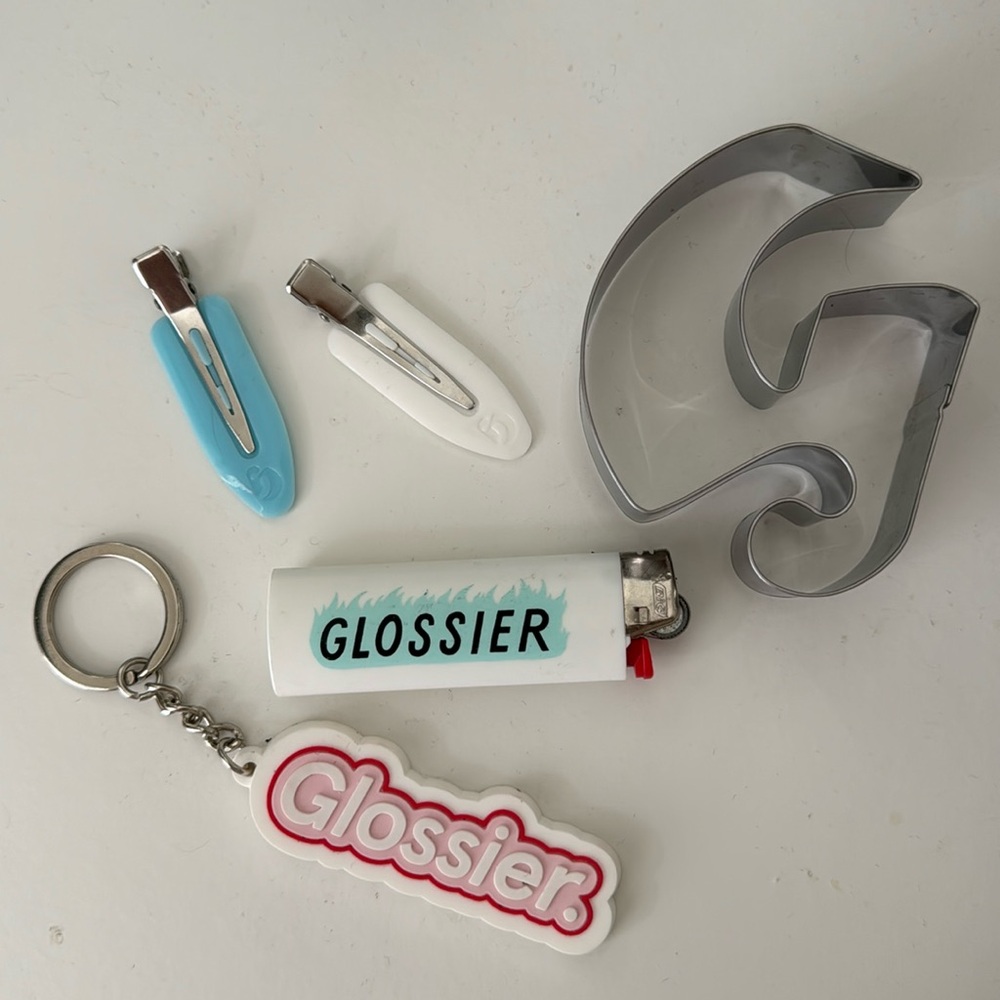 hair clips, lighter, keychain, and cookie cutter